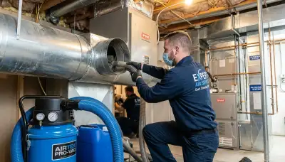 Technician cleaning air ducts for HVAC system in Aurora, CO home by Five Star Cooling